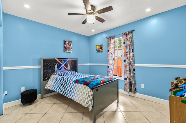 tiled bedroom with recessed lighting, ceiling fan, and baseboards