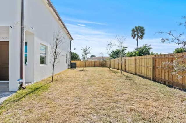 view of yard featuring a fenced backyard