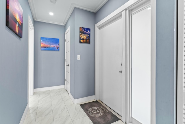 hall with marble finish floor and baseboards