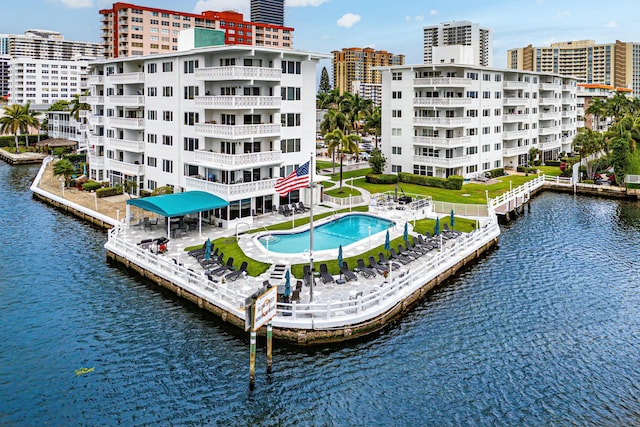 exterior space featuring a water view and a view of city