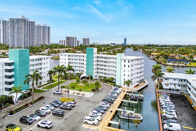 aerial view featuring a view of city and a water view