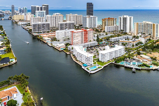 drone / aerial view with a water view and a view of city