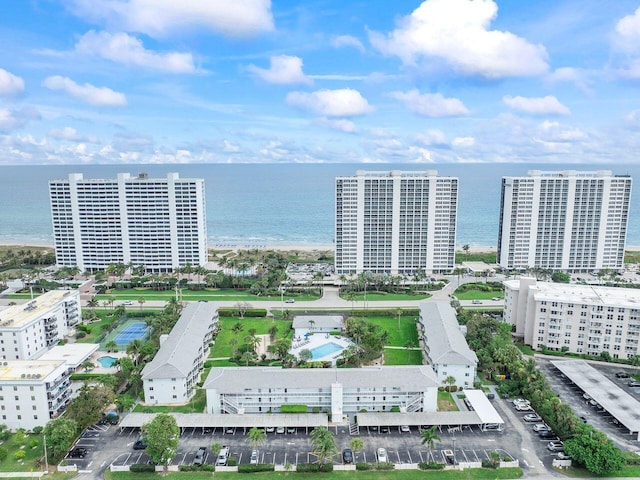 bird's eye view featuring a view of city and a water view