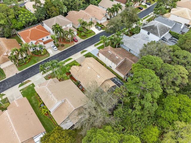 birds eye view of property with a residential view