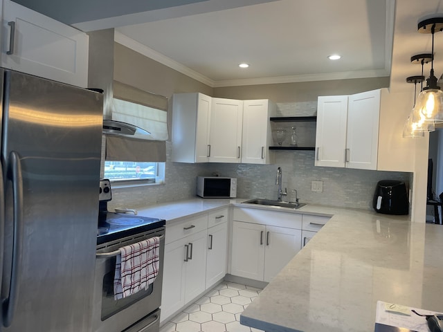 kitchen with appliances with stainless steel finishes, crown molding, a sink, and backsplash