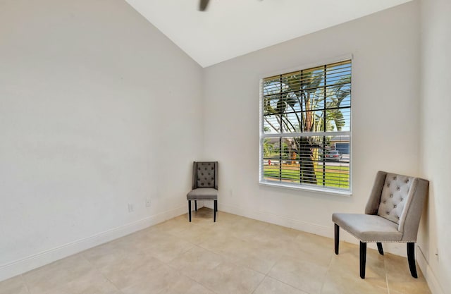961 SW Haas Ave, Port Saint Lucie, FL 34953 - living area with baseboards, light tile patterned floors, ceiling fan, and lofted ceiling
