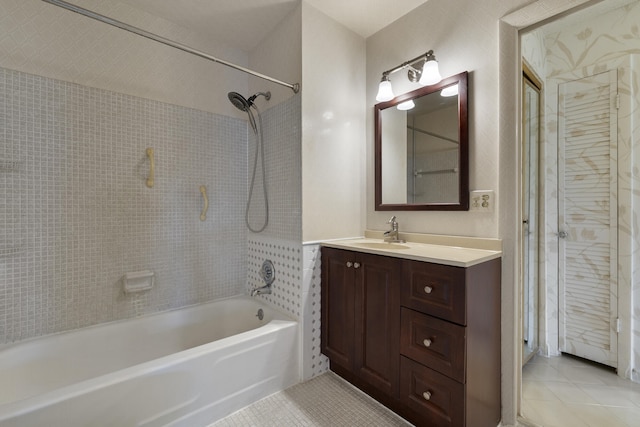 full bathroom featuring  shower combination, vanity, and tile patterned floors