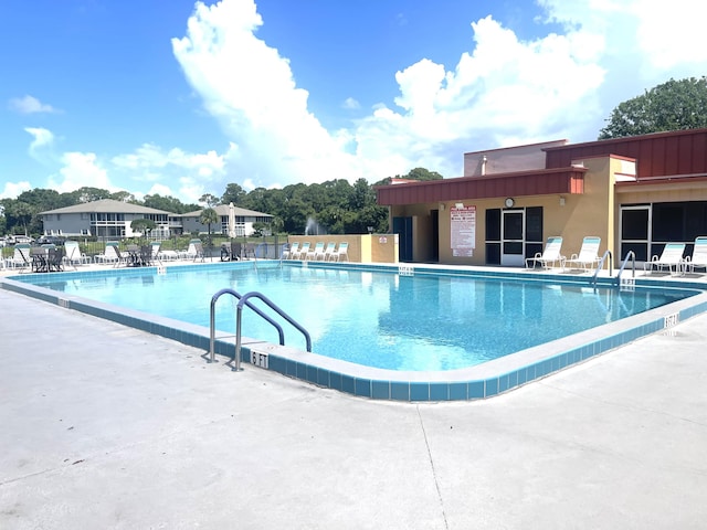 14 Lake Vista Trl Unit 102, Port Saint Lucie, FL 34952 - community pool with a patio area