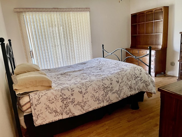 14 Lake Vista Trl Unit 102, Port Saint Lucie, FL 34952 - bedroom with wood finished floors