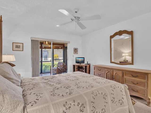 bedroom with access to outside, a textured ceiling, a ceiling fan, and carpet flooring