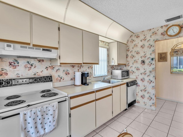 kitchen with white electric range oven, wallpapered walls, dishwasher, light countertops, and under cabinet range hood