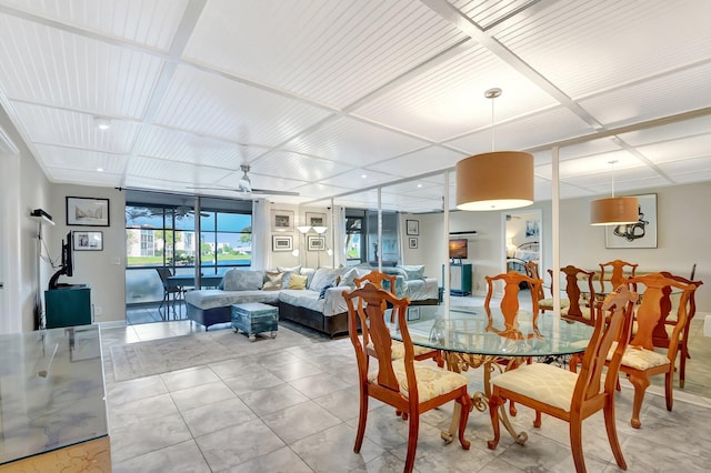 dining area featuring light tile patterned flooring