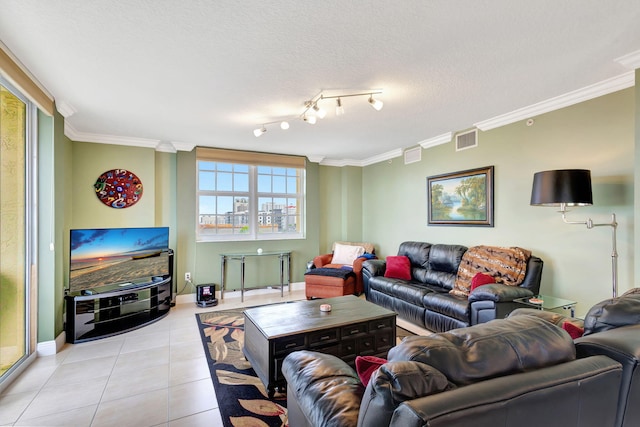 living area featuring ornamental molding, visible vents, a textured ceiling, and light tile patterned floors