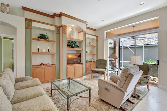 living room featuring light tile patterned floors, built in shelves, and recessed lighting