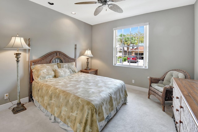 bedroom featuring recessed lighting, light carpet, ceiling fan, and baseboards