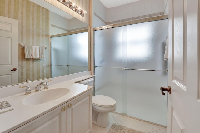 full bath with wallpapered walls, toilet, a shower with shower door, tile patterned floors, and vanity