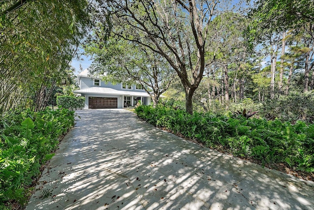 exterior space with a garage and driveway