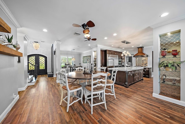 dining space with visible vents, baseboards, french doors, dark wood-style floors, and crown molding