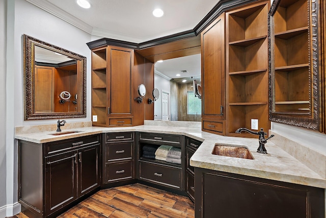 full bath with ornamental molding, wood finished floors, vanity, and recessed lighting