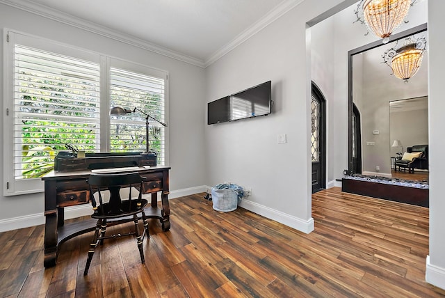 office featuring baseboards, arched walkways, ornamental molding, wood finished floors, and a notable chandelier