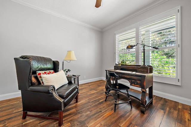 office area with a ceiling fan, baseboards, ornamental molding, and hardwood / wood-style floors