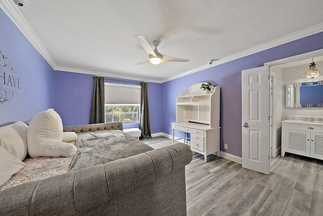 bedroom with crown molding, ceiling fan, a textured ceiling, light wood-type flooring, and baseboards