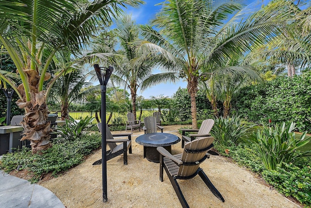 view of patio / terrace with a fire pit