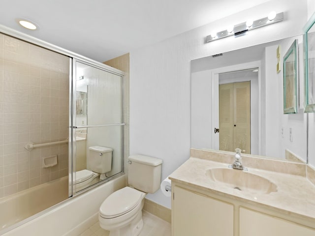 full bathroom with combined bath / shower with glass door, toilet, and vanity