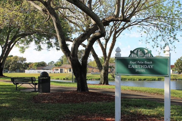 surrounding community featuring a yard and fence
