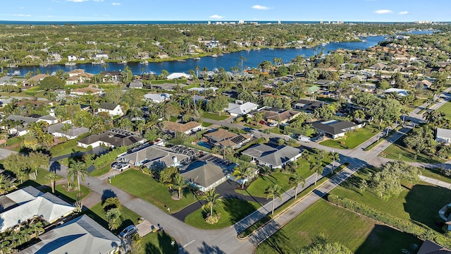 aerial view with a water view and a residential view