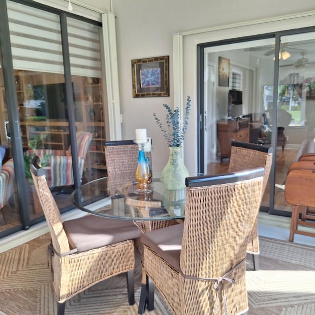 dining space featuring ceiling fan