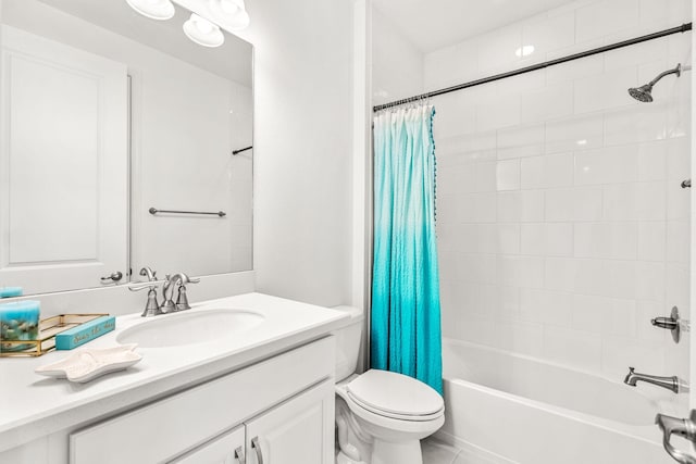 bathroom featuring vanity, shower / bath combo with shower curtain, and toilet