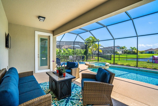 view of patio featuring a pool with connected hot tub and a lanai