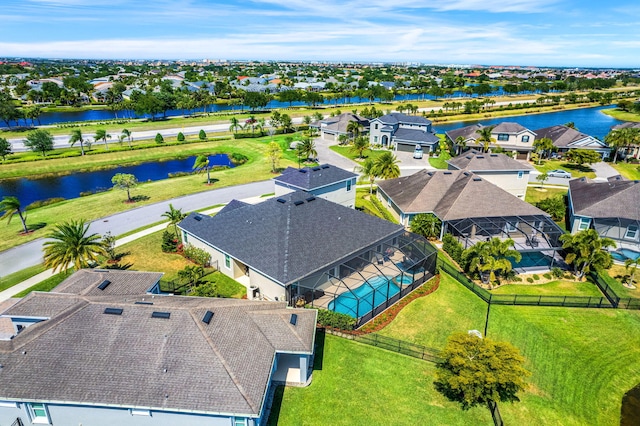 bird's eye view with a water view and a residential view