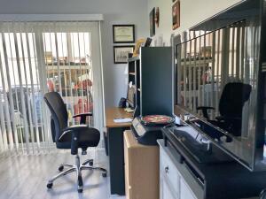 office space with wood finished floors