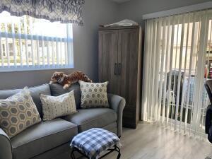 sitting room with wood finished floors