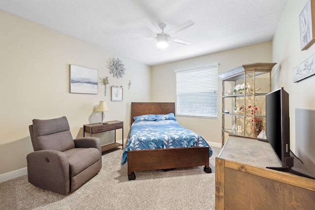 bedroom featuring carpet floors, ceiling fan, and baseboards