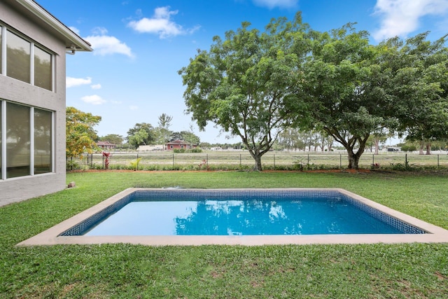 view of pool featuring a fenced backyard, a fenced in pool, and a yard