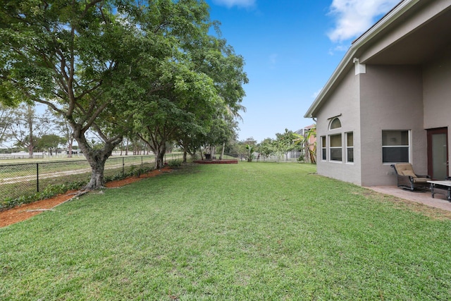 view of yard with a fenced backyard