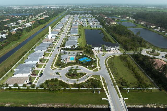 birds eye view of property featuring a water view