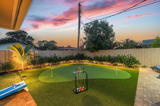 view of property's community with a fenced backyard