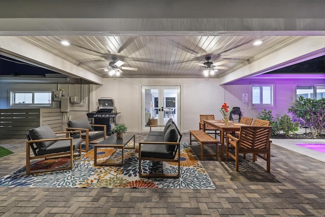 living room with wooden ceiling, ceiling fan, plenty of natural light, and french doors