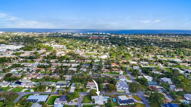 birds eye view of property with a residential view