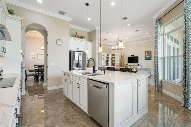 kitchen featuring arched walkways, marble finish floor, a wealth of natural light, visible vents, and appliances with stainless steel finishes