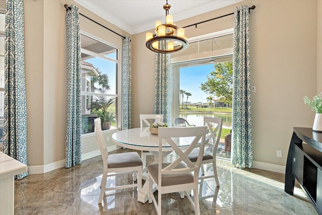 dining room with baseboards, marble finish floor, a water view, and crown molding