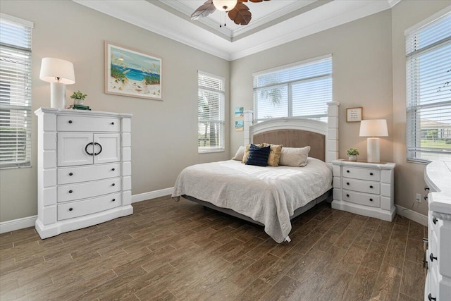 bedroom with multiple windows, ornamental molding, and dark wood-style flooring