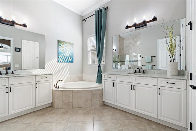 bathroom with ceiling fan, a sink, a tile shower, a bath, and crown molding