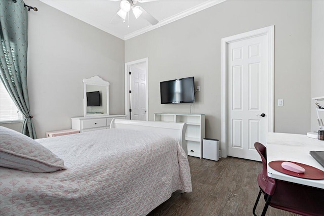 bedroom with ornamental molding, wood finished floors, and a ceiling fan