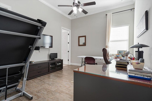 office space with ceiling fan, ornamental molding, and baseboards