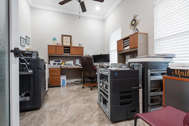 office area featuring ceiling fan and crown molding